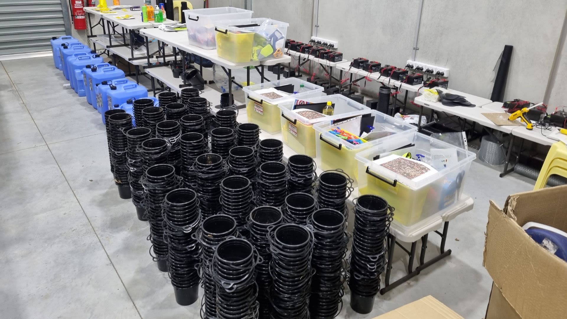 Warehouse filled with pots and containers ready for distribution