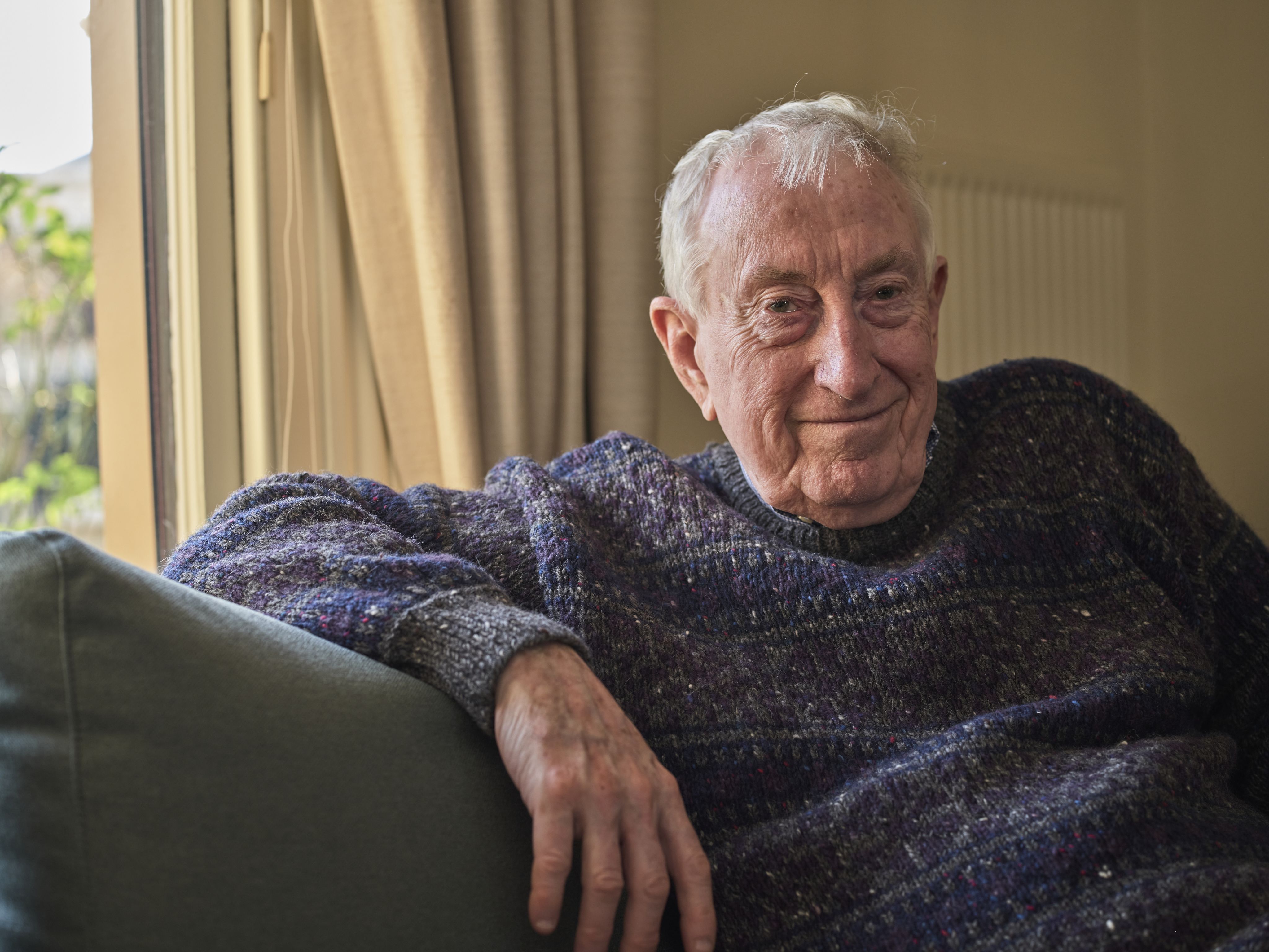 Nobel Laureate Professor Peter Doherty sitting down