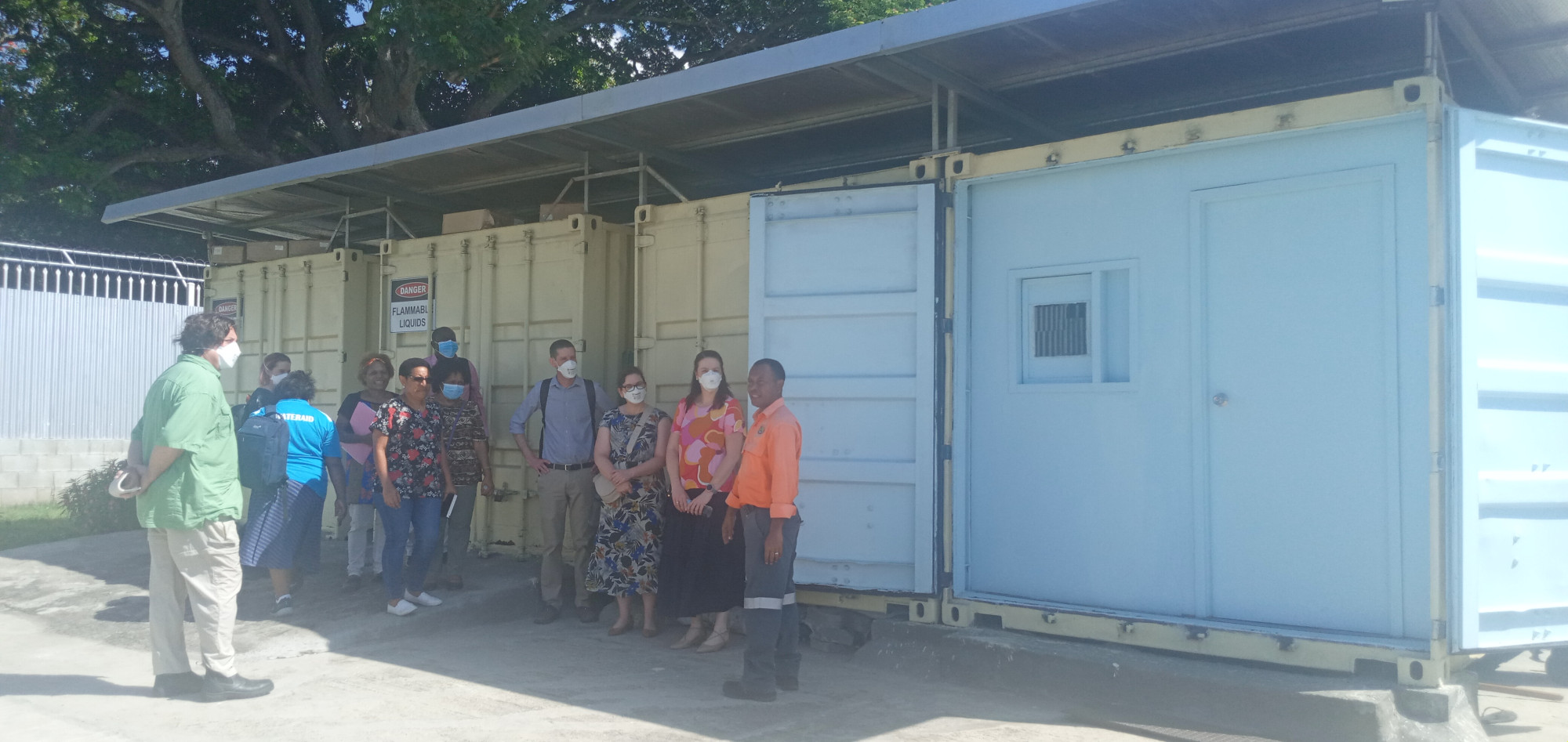 Project team visiting the shipping container site for the alcohol-based hand rub facility.