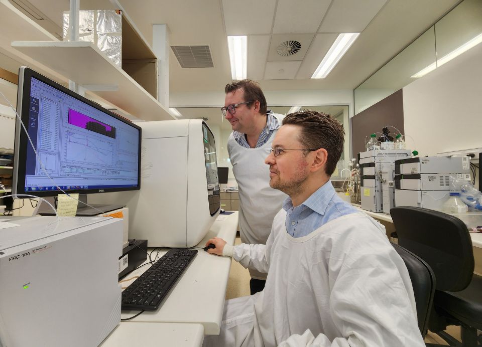 Dr Nichollas Scott and Dr Sacha Pidot working in the laboratory at the Doherty Institute.