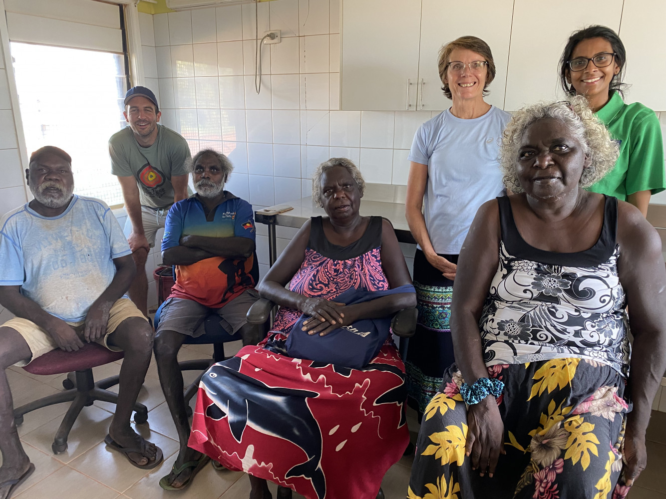 Research team members on Elcho Island. Front row left to right: George Gurruwiwi, Kenny Gongnini, Ruth Gulamanda and Mrs Dhurrkay. Second row, Josh Tynan, Beverley Ann-Biggs, Hasthi Dissanayake (Photo used with approval from individuals and families)